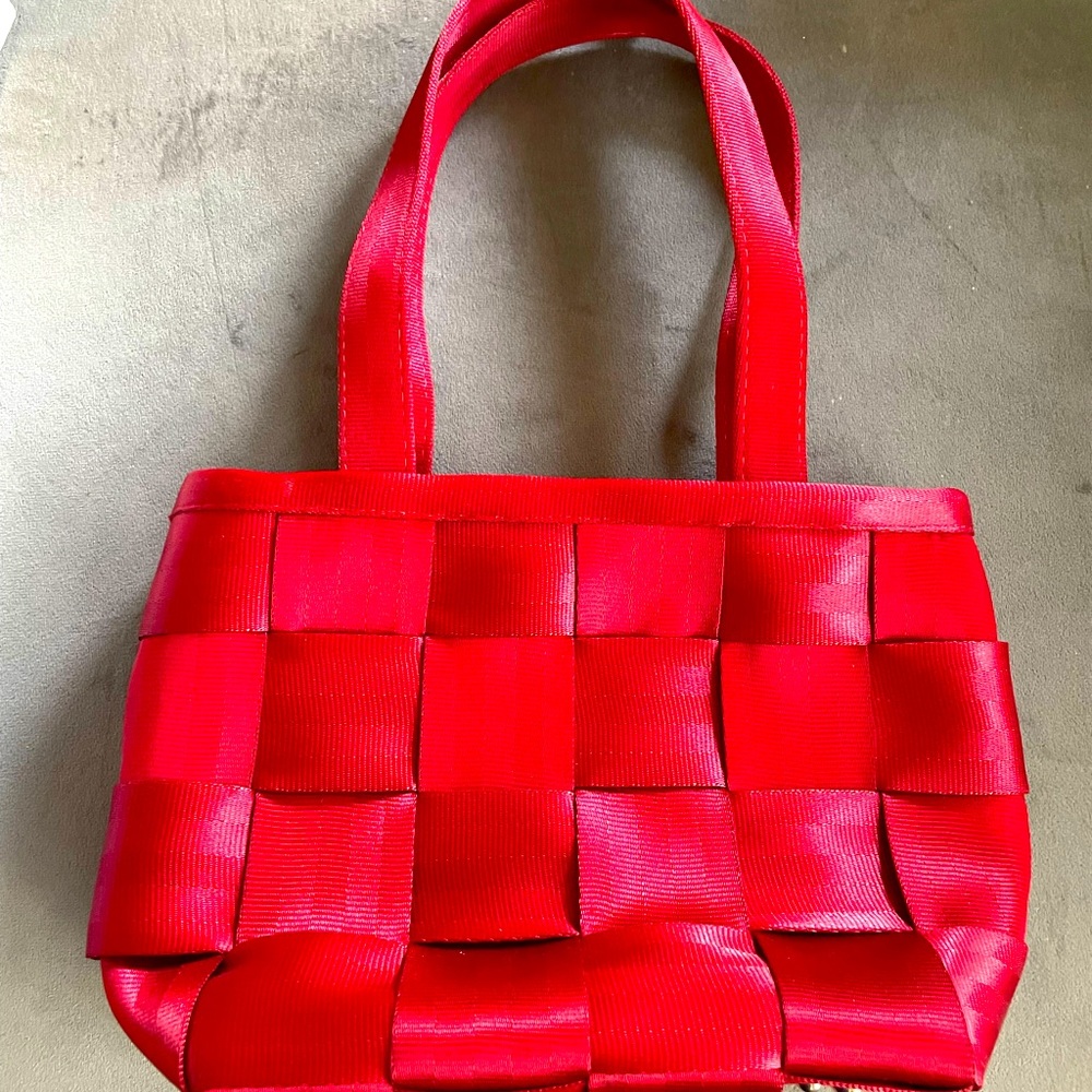 Red seatbelt purse